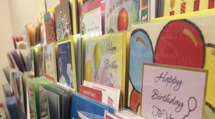 Photo of colorful greeting cards in the Harvey's Treasure Chest gift shop.